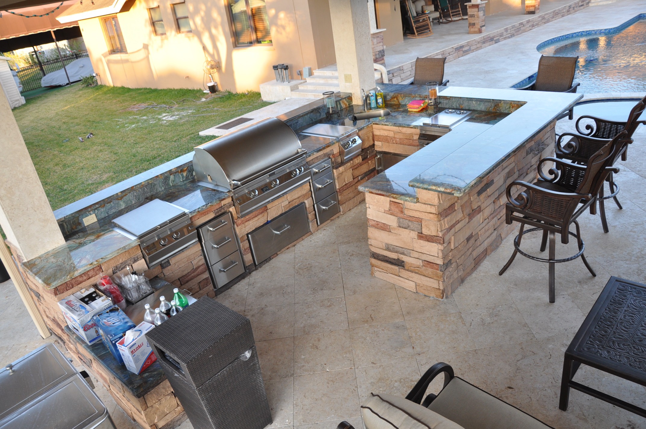 firemagic-built-in-bbq-and-gas-fire-pit-custom-built-with-blue-outdoor-kitchens-miami